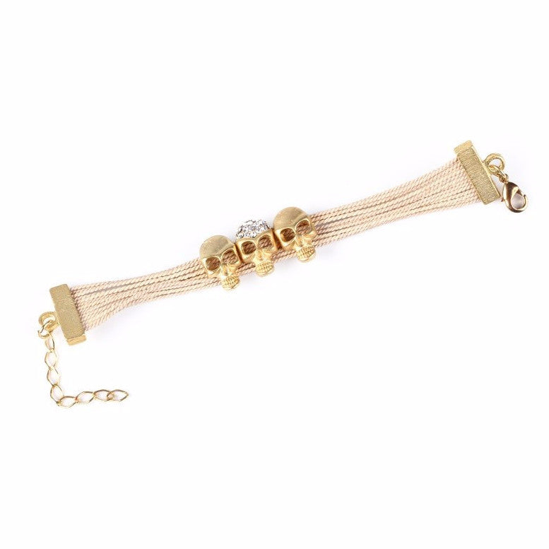 Compact Buriti Palm Straw Bracelet with Three Gold Plated Skulls